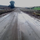 Carretera llena de agua como consecuencia del temporal. / LP